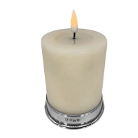 Picture An electric candle on a stylish pewter base - a perfect gift