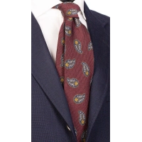 Picture A tasteful men's tie made of the highest quality wool with a dark yellow paisley pattern