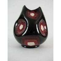 Picture A round ceramic flower vase from the mid-20th century with hand-made recesses