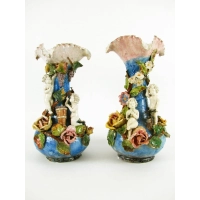 Picture A pair of Liberty vases made of polychrome ceramics