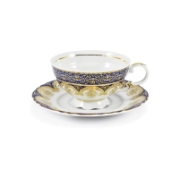Zdjęcie Bogato zdobiona porcelanowa filiżanka do herbaty ze spodkiem w kolorze kobaltowym i złotym z kolekcji Castle Sonata – Leander