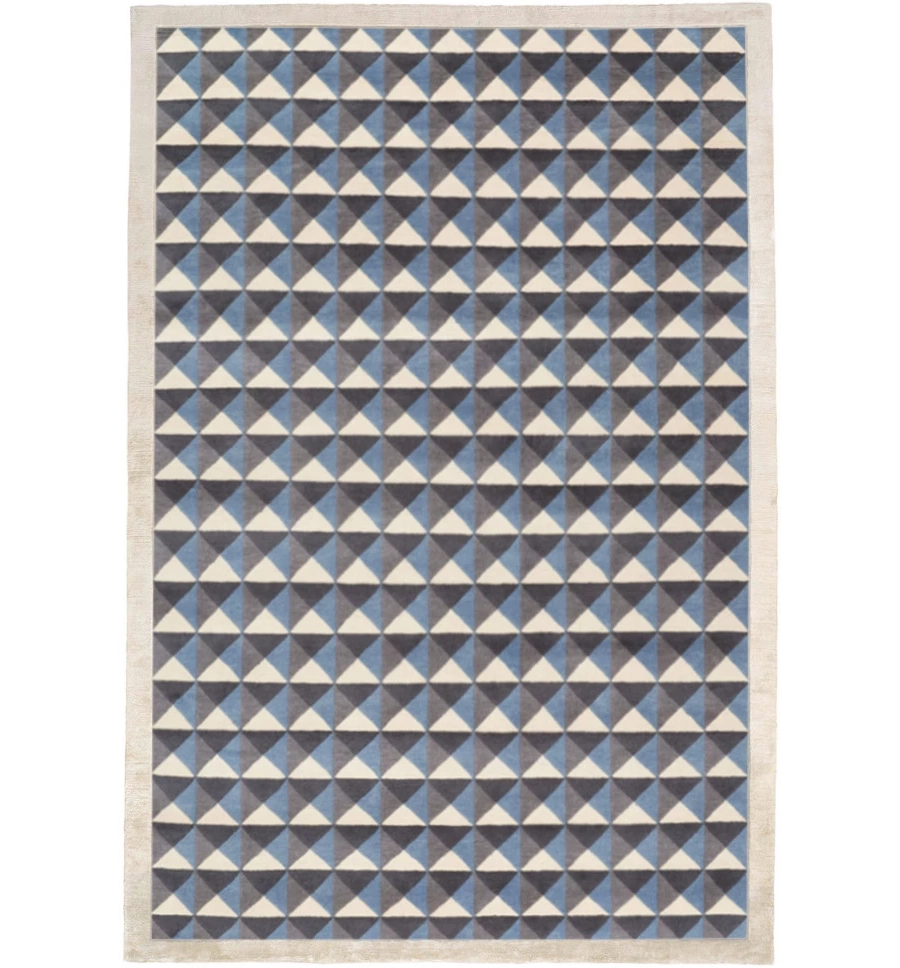 picture 1 A rug with a geometric pattern by Datina Studio