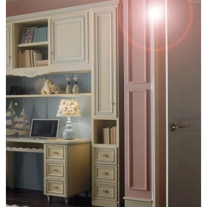 Picture An elegant large wardrobe with a desk and a chair for a young girl