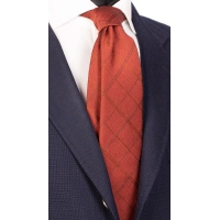 Picture A prestigious red checkered tie, made of the highest quality wool