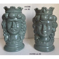 Picture Teste di Moro ceramic vases and flower pots in the shape of a woman's and a man's head