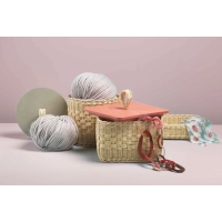 Picture Cylindrical wicker container with wooden or leather lid and woven handle